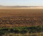 Урал пейзаж с полем распаханных на переднем плане